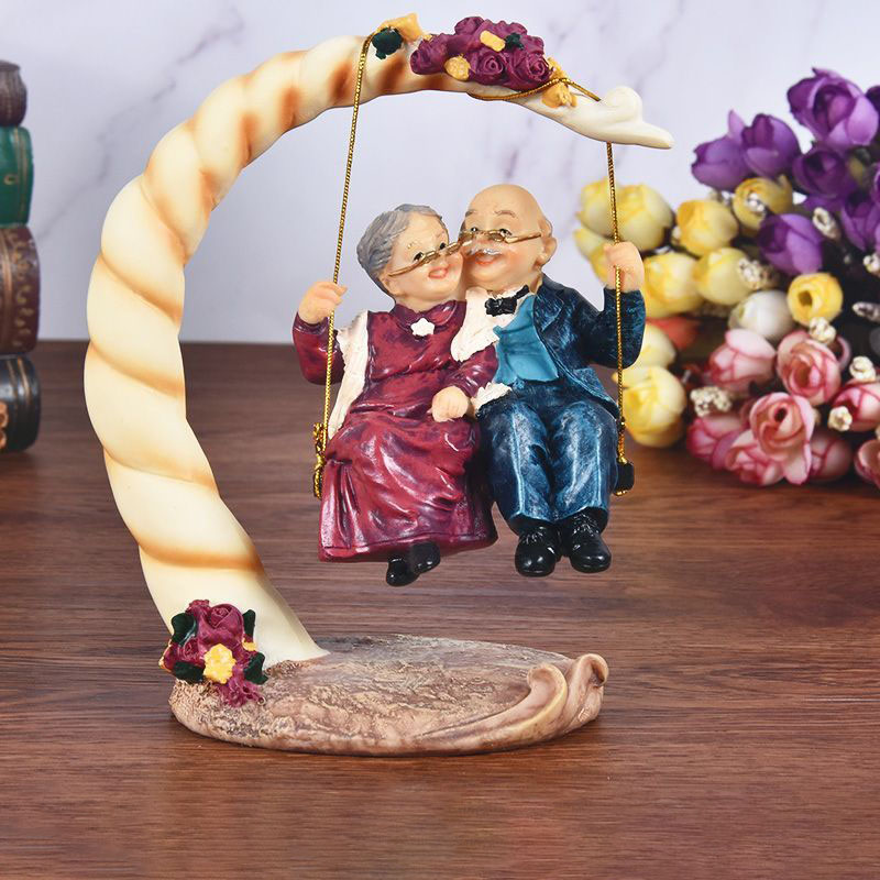 تماثيل راتين مسننين على أرجوحة - مراجعة Resin Art Wedding Gift وسعره